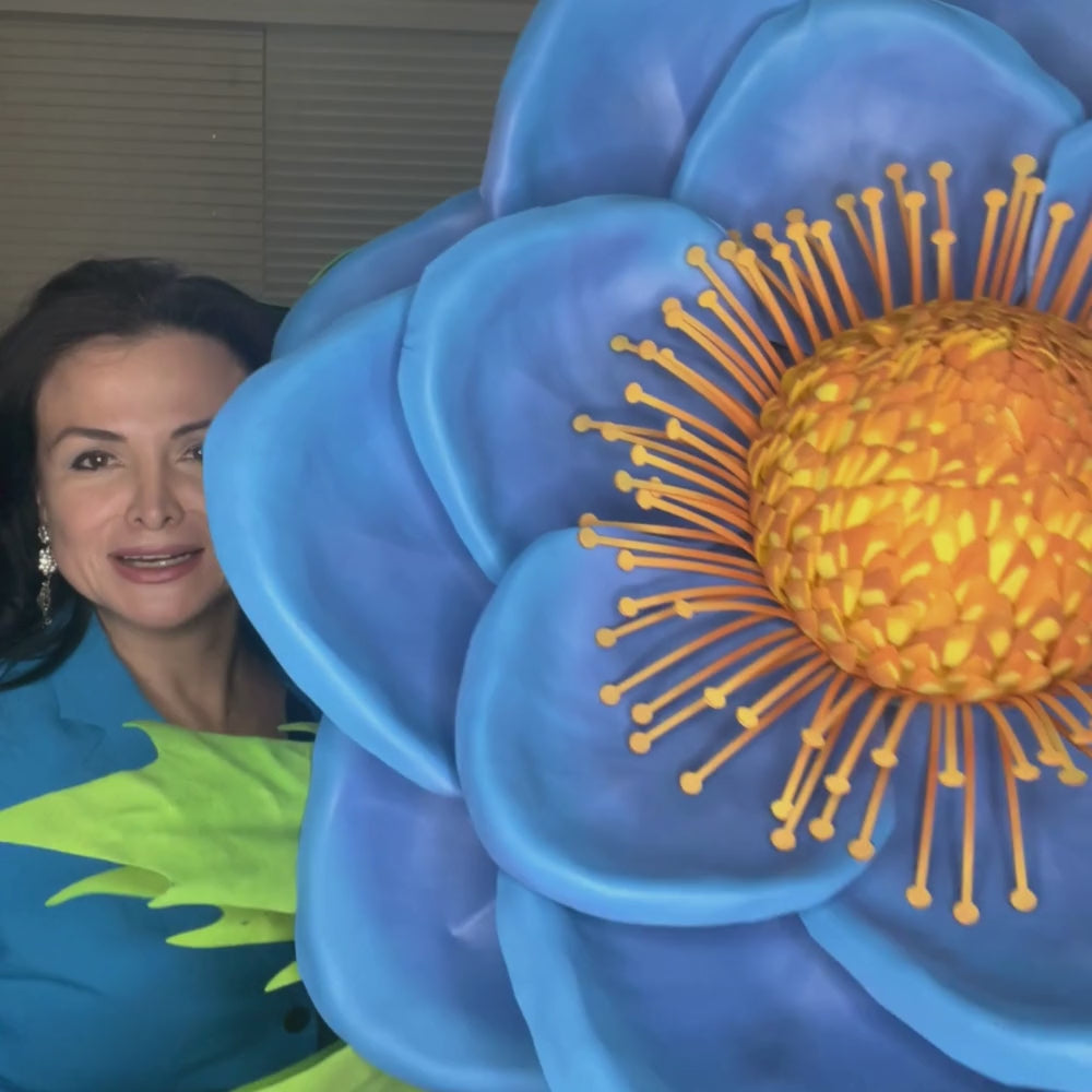 Woman holding a giant Blue Anemone