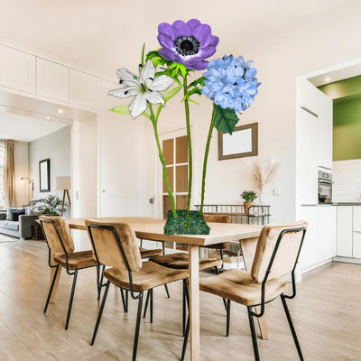 Restful Comfort Tall Table Centerpiece – White Lily, Blue Hydrangea, and Purple Anemone, 12" and 18" Diameter Flowers